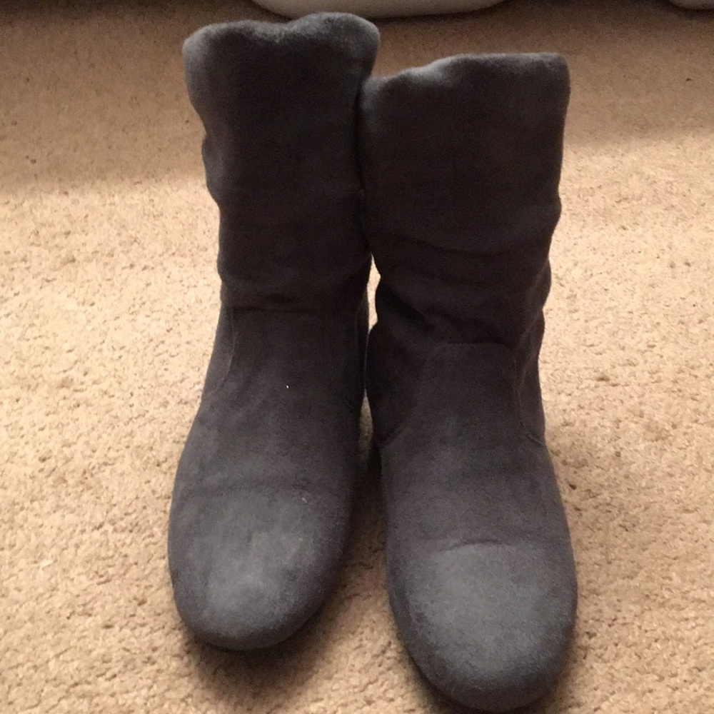 Pair of grey slouch boots.